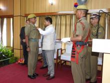 Shri Henry Sangma receiving Presidents Medal for Meritorious Service Republic Day 2014 from Hon'ble CM of Meghalaya